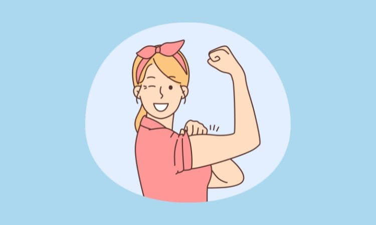 力こぶを見せる自信のある女性